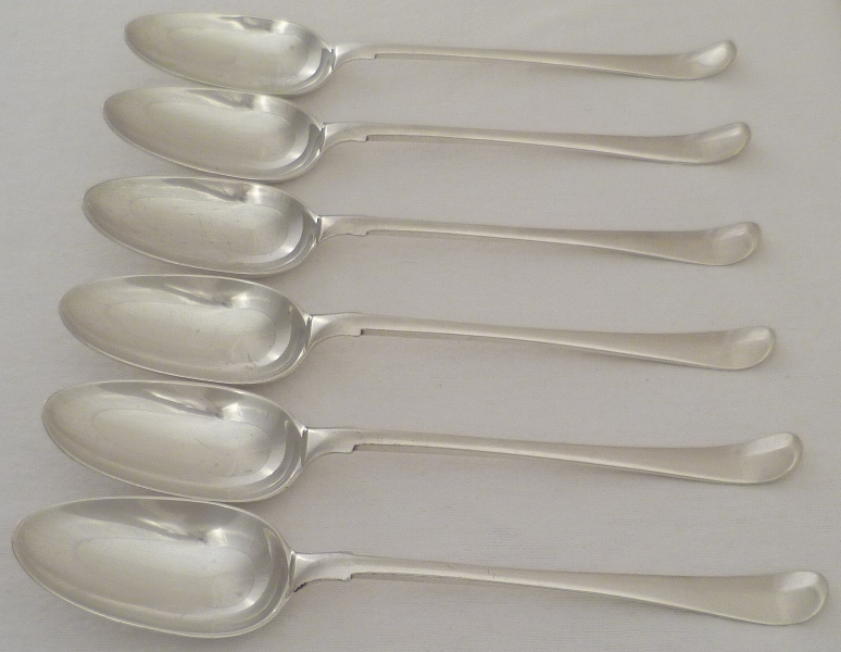Six Georgian silver Hanoverian with shoulders pattern table spoons ...