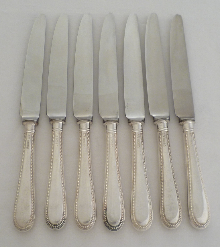 Seven bead edged silver Old English pattern dessert knives John Biggin ...